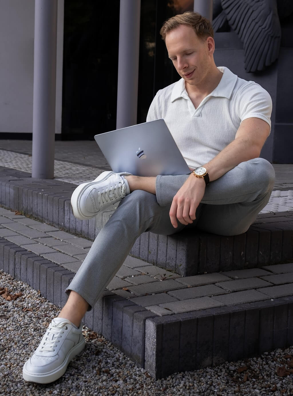 Marcell Benko working on a laptop